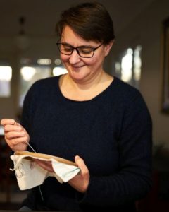 Kate Tribe working on embroidery textile art piece, Southern Highlands artist in studio