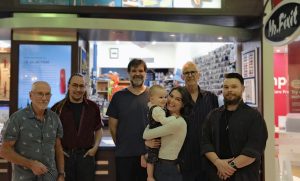 The Mr Fixit team outside the Bowral repair shop in Springett’s Arcade.